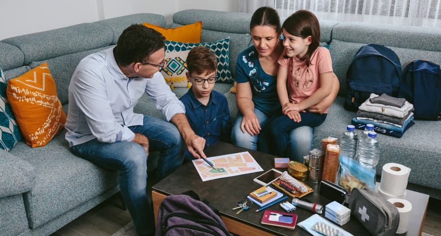 Dad showing family where to assemble during an emergency